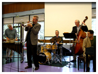 Tony Pacini performs with Carl Saunders